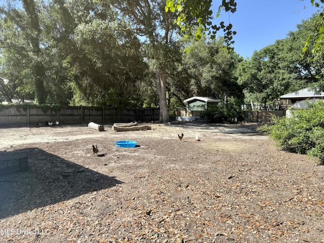 900 Orange St, Ocean Springs, MS 39564 - view of yard with view of scattered trees