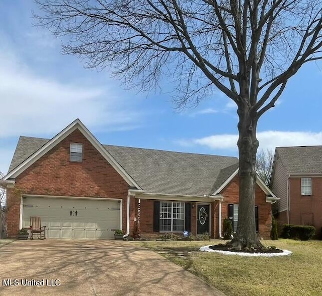 single story home featuring a garage