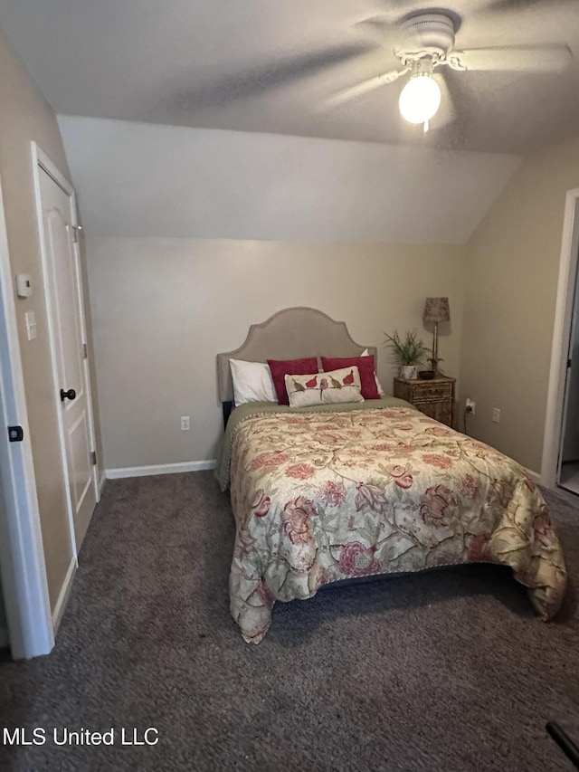 carpeted bedroom featuring ceiling fan and lofted ceiling