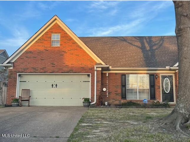 view of front of property with a garage