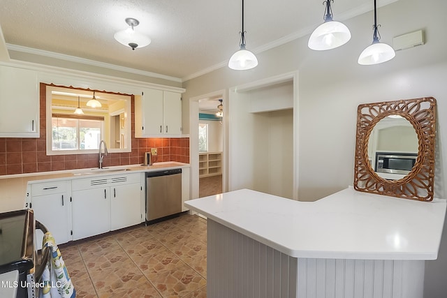 kitchen with dishwasher, tasteful backsplash, white cabinets, and hanging light fixtures