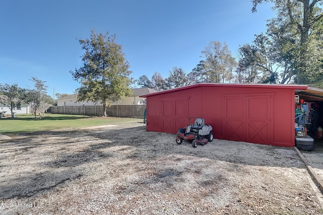 garage with a yard