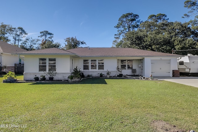 single story home with a garage and a front yard