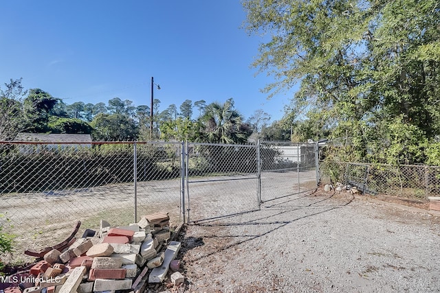 5211 Washington Ave, Gulfport, MS 39507 - view of yard featuring a gate