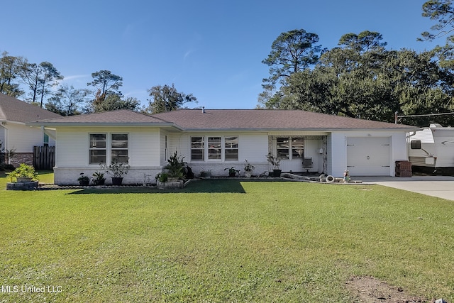 5211 Washington Ave, Gulfport, MS 39507 - view of front of property with driveway, a garage, a front yard, and brick siding