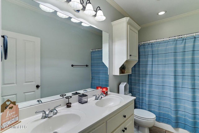 bathroom with vanity, toilet, crown molding, and walk in shower