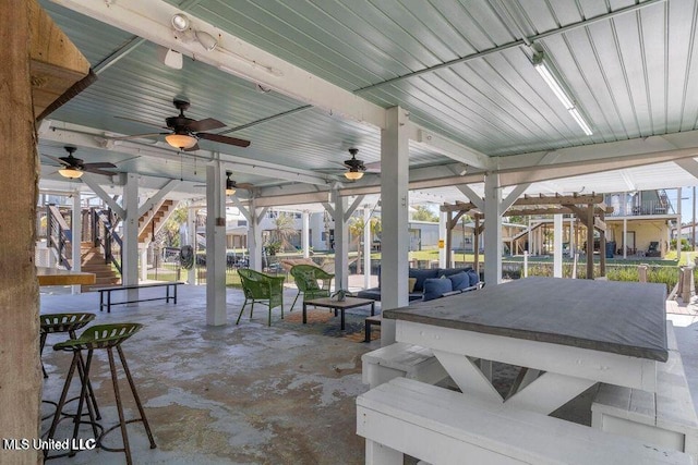842 Deer Dr, Bay Saint Louis, MS 39520 - view of patio / terrace with ceiling fan and stairway