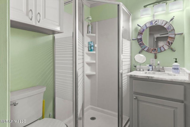 842 Deer Dr, Bay Saint Louis, MS 39520 - bathroom featuring a stall shower, toilet, and vanity