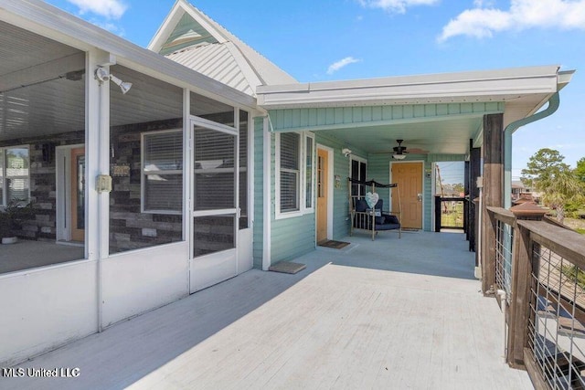 842 Deer Dr, Bay Saint Louis, MS 39520 - view of patio with a sunroom