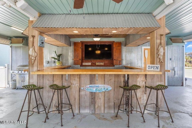 842 Deer Dr, Bay Saint Louis, MS 39520 - bar area with unfinished concrete floors