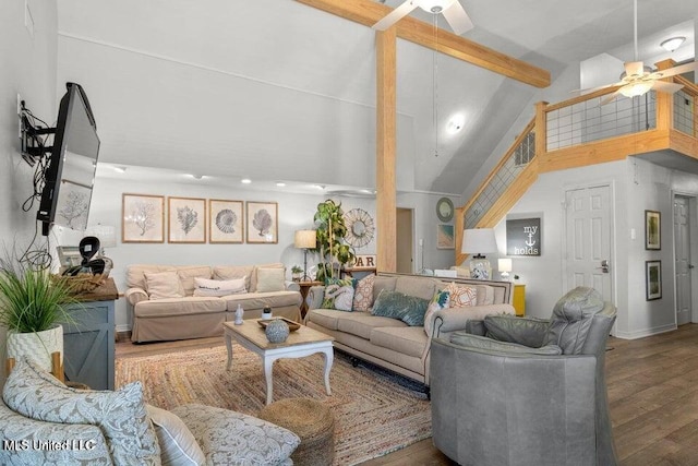 842 Deer Dr, Bay Saint Louis, MS 39520 - living room with a ceiling fan, beam ceiling, wood finished floors, high vaulted ceiling, and baseboards