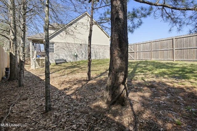 view of yard with fence