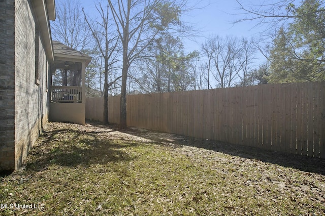 view of yard with fence