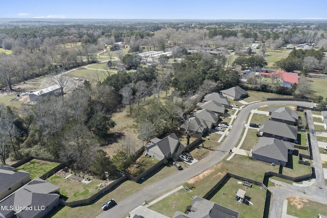 birds eye view of property with a residential view