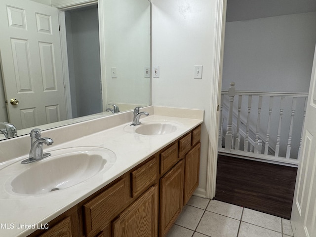 7413 Fox Creek Dr, Olive Branch, MS 38654 - bathroom featuring double vanity, a sink, and tile patterned flooring