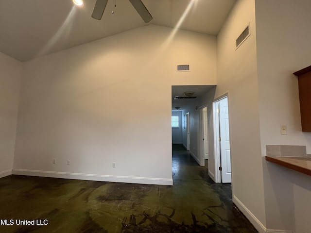 11045 Idaho St, Bay Saint Louis, MS 39520 - corridor featuring concrete floors and high vaulted ceiling