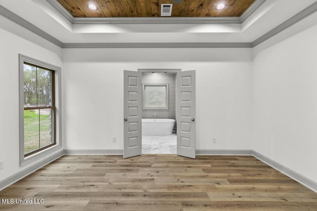115 Grayson Way, Madison, MS 39110 - unfurnished bedroom featuring a raised ceiling, ornamental molding, wood ceiling, baseboards, and wood finished floors