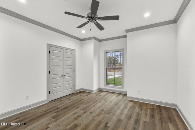115 Grayson Way, Madison, MS 39110 - unfurnished bedroom with ornamental molding, wood finished floors, recessed lighting, baseboards, and a ceiling fan