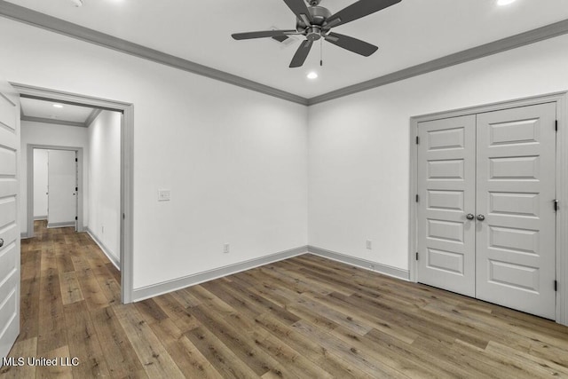 115 Grayson Way, Madison, MS 39110 - unfurnished bedroom with crown molding, wood finished floors, recessed lighting, a closet, and baseboards