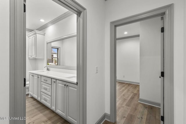 115 Grayson Way, Madison, MS 39110 - full bathroom featuring wood finished floors, double vanity, baseboards, recessed lighting, and ornamental molding