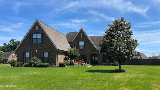 14291 Buttercup Dr, Olive Branch, MS 38654 - view of front of home featuring brick siding and roof with shingles