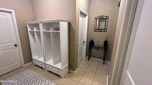 14291 Buttercup Dr, Olive Branch, MS 38654 - mudroom with light tile patterned floors and baseboards