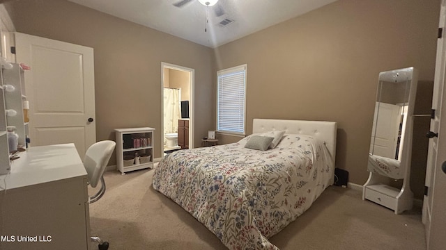 14291 Buttercup Dr, Olive Branch, MS 38654 - bedroom featuring light colored carpet, baseboards, and ensuite bath