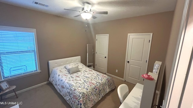 14291 Buttercup Dr, Olive Branch, MS 38654 - carpeted bedroom featuring baseboards and a ceiling fan