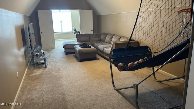 14291 Buttercup Dr, Olive Branch, MS 38654 - carpeted living area with baseboards and vaulted ceiling