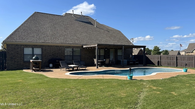 14291 Buttercup Dr, Olive Branch, MS 38654 - rear view of house with brick siding, a patio area, and a shingled roof