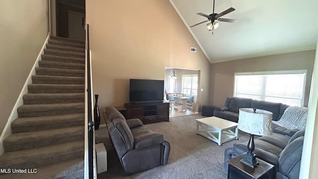 14291 Buttercup Dr, Olive Branch, MS 38654 - carpeted living room with stairway, high vaulted ceiling, a ceiling fan, ornamental molding, and baseboards
