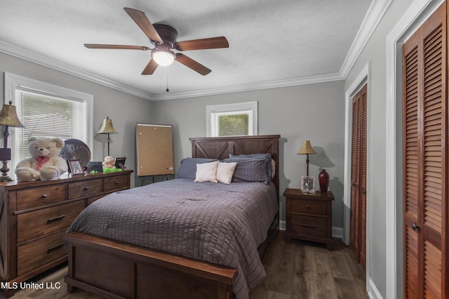 156 Cobbville Rd, Canton, MS 39046 - bedroom featuring wood finished floors, ornamental molding, a ceiling fan, and a textured ceiling