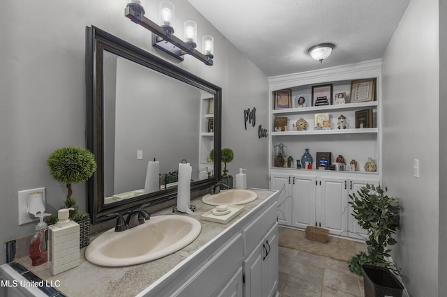 156 Cobbville Rd, Canton, MS 39046 - bathroom with double vanity and a textured ceiling
