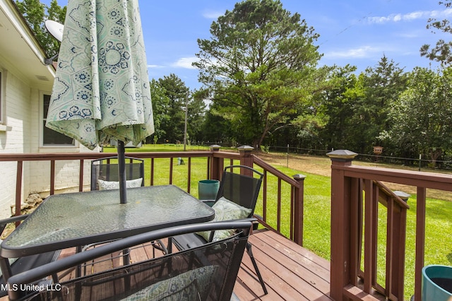 156 Cobbville Rd, Canton, MS 39046 - wooden terrace featuring outdoor dining area and view of wooded area
