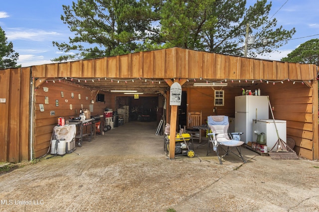 156 Cobbville Rd, Canton, MS 39046 - garage with freestanding refrigerator