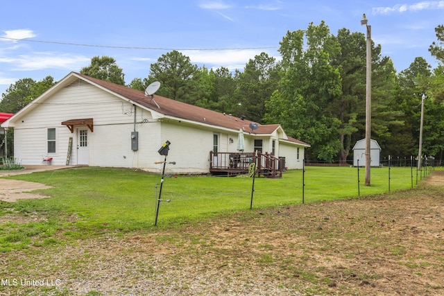 156 Cobbville Rd, Canton, MS 39046 - view of property exterior with a wooden deck, a shed, and brick siding