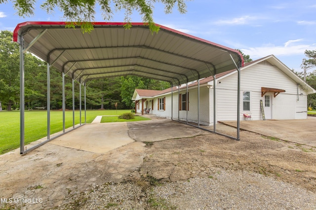 156 Cobbville Rd, Canton, MS 39046 - view of parking featuring a carport and driveway