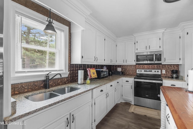 156 Cobbville Rd, Canton, MS 39046 - kitchen featuring stainless steel appliances, wood counters, white cabinets, tasteful backsplash, and dark wood-type flooring