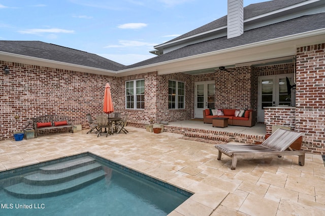 exterior space featuring a patio and an outdoor hangout area