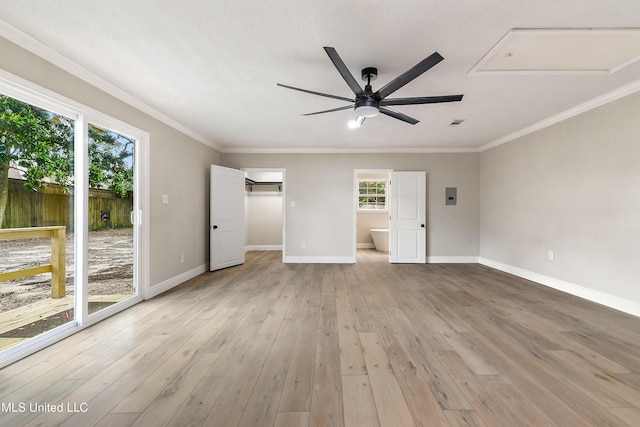 371 Lakeview Blvd, Biloxi, MS 39531 - unfurnished bedroom featuring access to outside, light wood finished floors, crown molding, ceiling fan, and a walk in closet