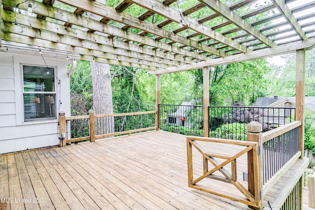 wooden deck with a pergola