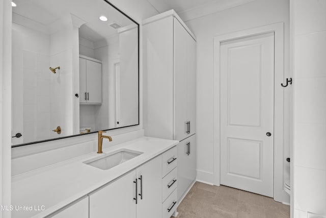 full bathroom featuring a shower, visible vents, and vanity