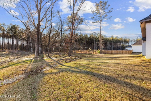 view of yard featuring fence