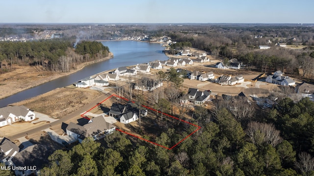 aerial view featuring a water view and a residential view