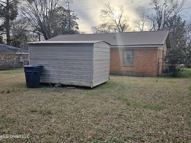 view of outdoor structure with fence