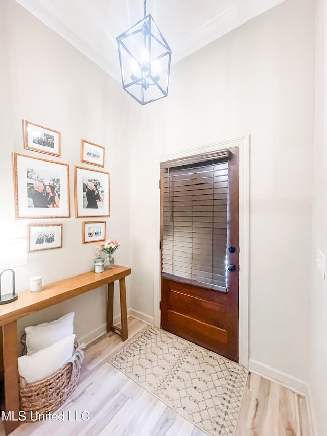 420 Stoneybrook Dr, Brandon, MS 39042 - foyer entrance featuring ornamental molding, a chandelier, and wood finished floors