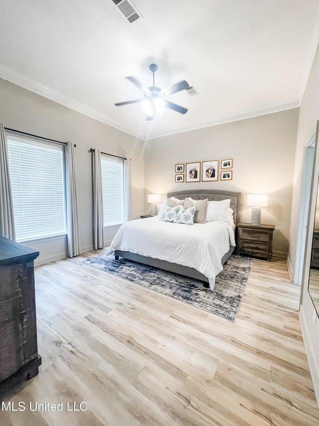 420 Stoneybrook Dr, Brandon, MS 39042 - bedroom with ornamental molding, light wood-type flooring, and a ceiling fan