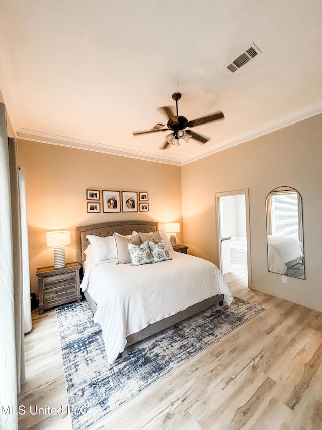 420 Stoneybrook Dr, Brandon, MS 39042 - bedroom with ornamental molding, light wood finished floors, ensuite bath, and a ceiling fan