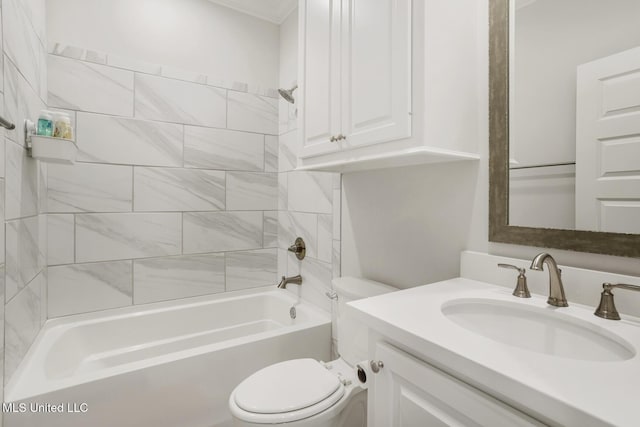 bathroom featuring bathing tub / shower combination, toilet, and vanity