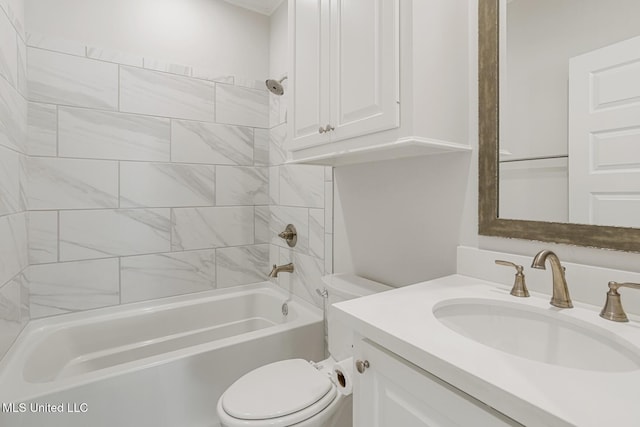 bathroom featuring vanity, shower / tub combination, and toilet